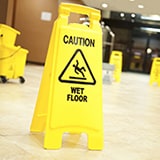 yellow wet floor sign